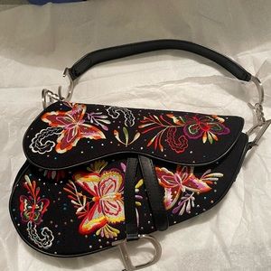 Christian Dior embroidered saddle bag.